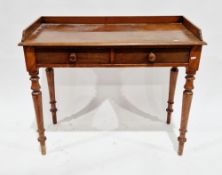 Victorian mahogany side table with three-quartered galleried top, two frieze drawers with turned