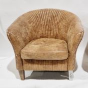 Oka Crosby light brown leather upholstered tub armchair, the back with a studded and fluted