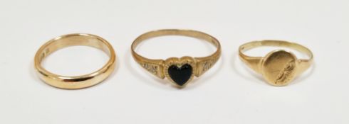 Three 9ct yellow gold rings including wedding band, size I 1/2, signet ring, size F 1/2 and ring set