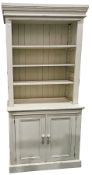 19th century-style painted pine bookcase cupboard, the upper section with moulded cornice over three