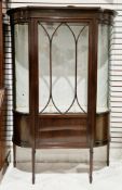 Early 20th century mahogany bowfronted display cabinet in the Sheraton manner, the single astragal