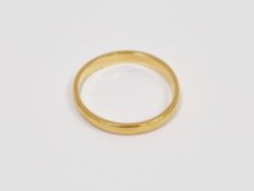 22ct yellow gold plain wedding band, size J, approximate weight 2.1 grams