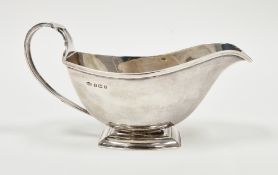 Art Deco silver sauceboat, Birmingham 1930, Boodle & Dunthorne, of plain form with reeded loop