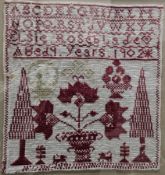 Early 20th century sampler by Elsie Rose Glade, aged 9 years, in 1902, featuring the alphabet and