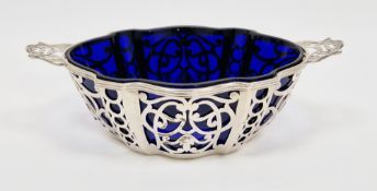 Sterling silver bon-bon dish, of shaped oval form with pierced scrolling sides and twin handles,