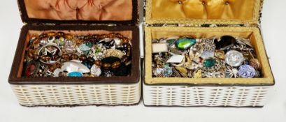 Two sewing baskets filled with costume jewellery including necklaces, brooches, bracelets,