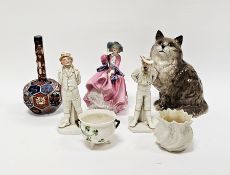 Pair of Royal Worcester Countries of the World figures, designed by James Hadley, late 19th century,