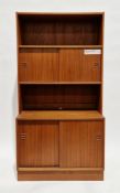 Mid-century Danish Feldballes Mobelfabrik teak wall unit comprising a shelf over two sliding