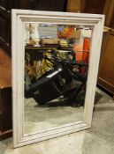 Rectangular bevel edged mirror in white painted moulded pine frame (108.5cm x 77cm)