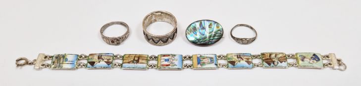 Egyptian white metal bracelet having eight enamelled panels depicting tourist scenes, 19.5cm long
