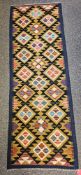 Maimana Kilim black ground runner with one row of eight hooked lozenges and two rows of seven