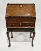 George II oak bureau, the fall-front with fitted interior including pigeonholes, drawers and well,