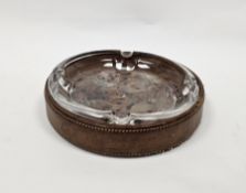 LOT WITHDRAWN; Gucci leather and feather mounted glass ashtray of circular form, the thick walled