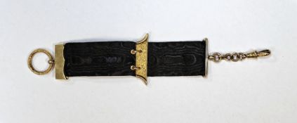 Late 19th / early 20th century 9ct yellow gold ribbon fob, comprising a ring held on a black