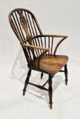19th century elm and ash Windsor wheelback elbow chair on turned legs with a H-stretcher, 99cm