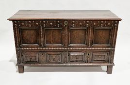 17th/18th century oak mule chest, the two-plank rectangular top with thumb-mould edge, opening to an