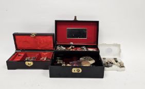 Collection of costume jewellery including rings, necklaces, brooches, charms and other small