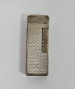 Dunhill silver plated engine-turned cigarette lighter in original fitted case, stamped 'Brit.726982,