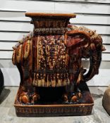 Chinese brown glazed ceramic stool/stand in the form of an elephant, 57cm high  Condition Report