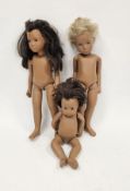 Two original Sasha dolls one with long brown hair (arms damaged) and the other with cut blonde hair,