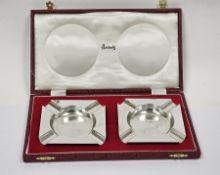 Matched pair of silver ashtrays, London 1952  and 1977, S J Rose & Son, of plain square form, 9cm