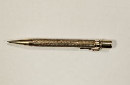 Sampson Mordan & Co 9ct yellow gold cased propelling pencil, having engine-turned decoration and