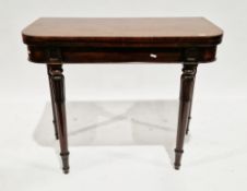 Early 19th century mahogany fold-over card table, the rectangular top with rounded corners,