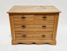 Edwardian satin walnut chest of drawers, the rectangular top with thumb-mould edge, over two short