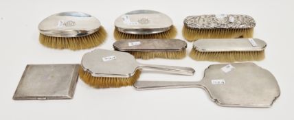 Assorted silver mounted dressing table items, including: an Art Deco engine turned mirror and