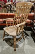 Elm and beech lath back windsor elbow chair on turned ringed legs and a H-stretcher, 113cm high x