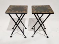 Pair of modern metal folding lamp tables, the square black tops with chinoiserie-style decoration,