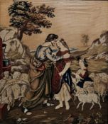 19th century tapestry panel depicting a shepherd and his family with sheep by a well, contained in a