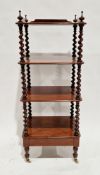 19th century mahogany four-tier whatnot of square form, the top shelf with three-quarter galleried