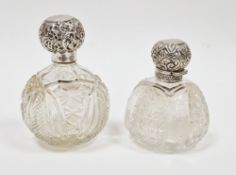 Two Victorian silver-mounted cut-glass perfume bottles, one hallmarked Birmingham, 1886, the other