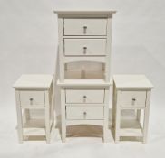 Pair of Marks & Spencers Hastings Range white bedside chests, each with two drawers and silvered