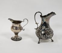 Victorian silver milk jug, Sheffield 1856, Martin Hall & Co, of baluster form with embossed floral