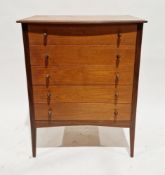 Mid-century Avalon teak chest of four drawers, each drawer with two cone-shaped wooden handles, on