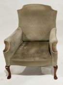 Early 20th century green upholstered armchair with pale pink and green piping, on front wooden