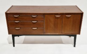 Mid-century mahogany-effect sideboard comprising three drawers with reeded fronts and metal