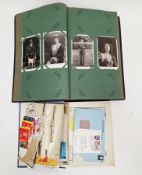 Early 20th century postcard album containing over 200 mostly black and white postcards relating to