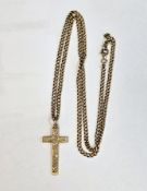 9ct hallmarked yellow gold cross pendant with scrolling engraving to front, 3cm high held on 9ct