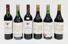 Two bottles of Chateau Haut Brion Graves Cru Classe 1986 and two vintage 1983 Graves with two