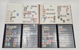 Four albums of 20th century Commonwealth and World stamps and an album of late 1970's/early 1980's