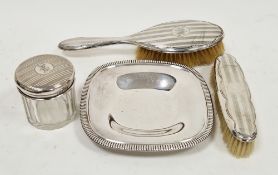 Early 20th century four-piece silver dressing table set, various assay marks and date letters,