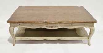French-style coffee table, the stained pine shaped rectangular top over a painted base with