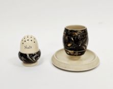 Macintyre pottery agate ware 'acorn' shaped salt and an egg-cup on fixed stand, late 19th century