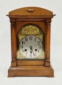 20th century mahogany cased bracket clock by Junghans, the circular silvered dial with Arabic