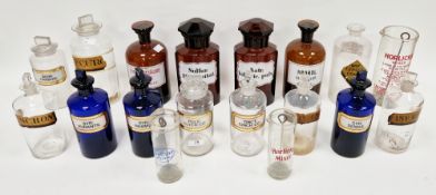 15 late 19th and early 20th century glass apothecary bottles in sizes, including three blue tinted