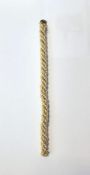 Italian18k yellow gold and seed pearl bracelet, comprising a gold twisted rope intertwined with a