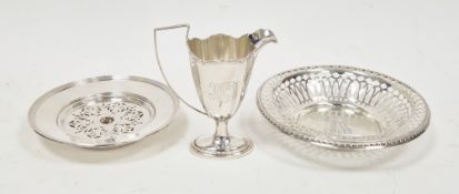 Three sterling silver items, including a round bon-bon dish with pierced rim, 18cm diameter, cream